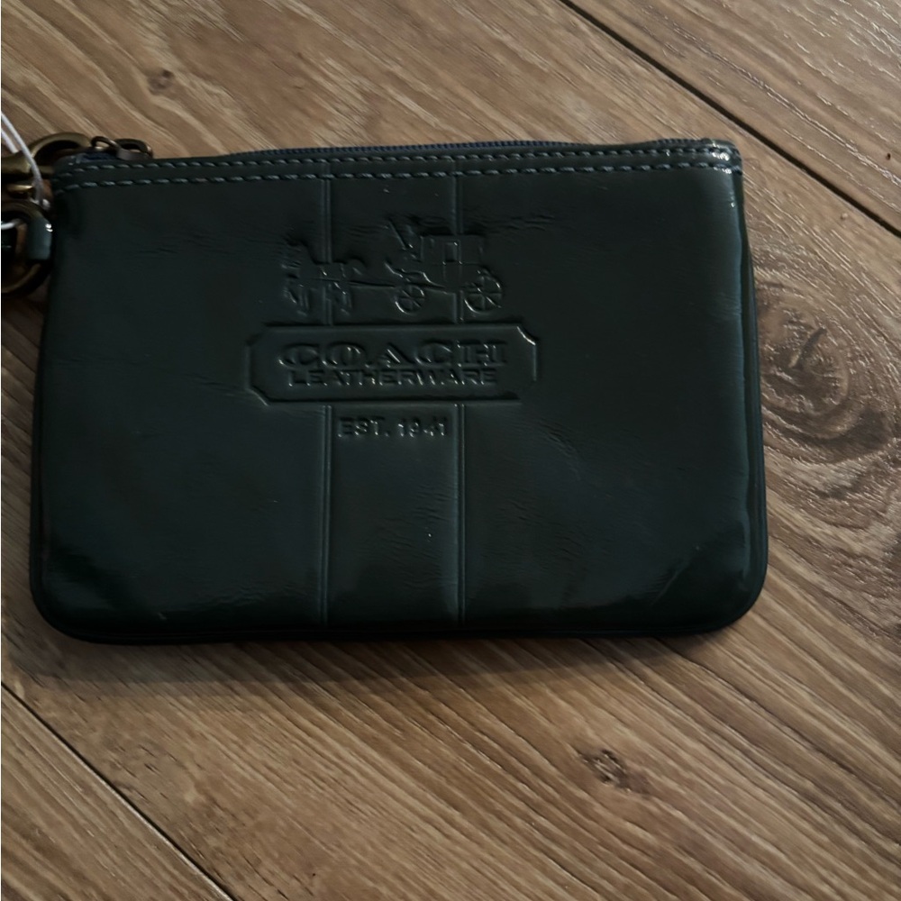 Coach dark Green Leather wristlet.